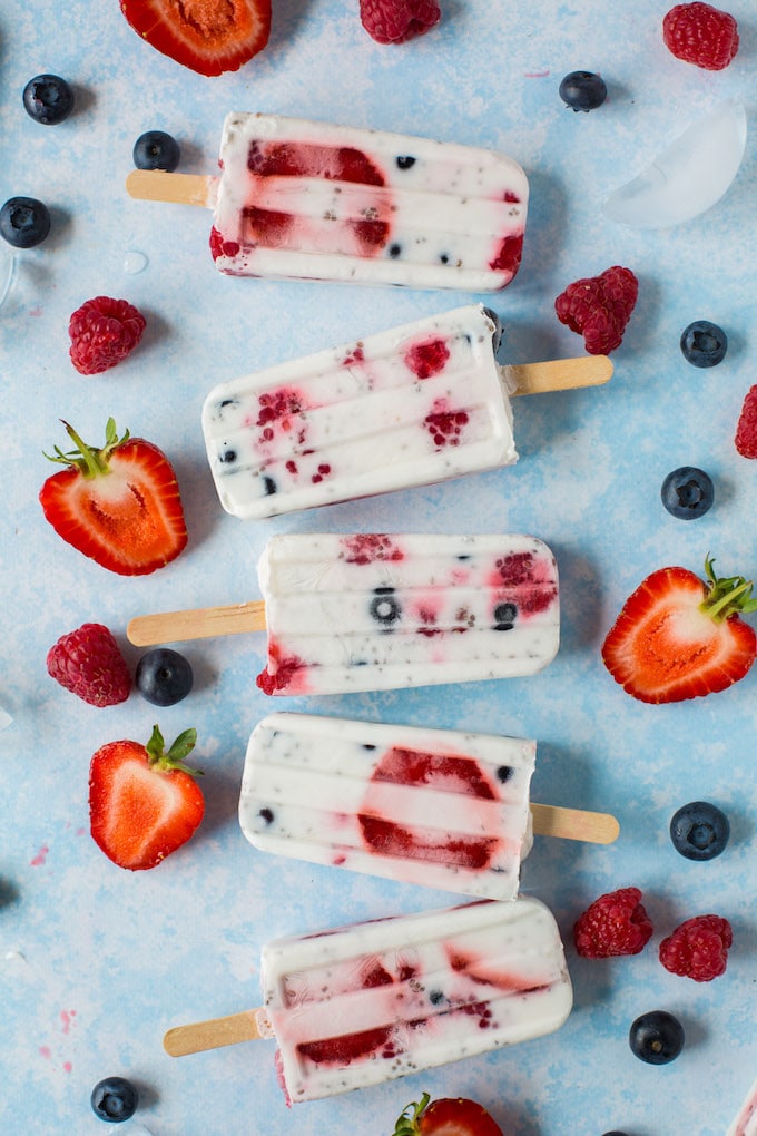 Fruity Chia Coconut Popsicles - 5 ingredients and lightly sweetened popsicles speckled with chia seeds and mixed berries | Gluten Free + Vegan + Paleo