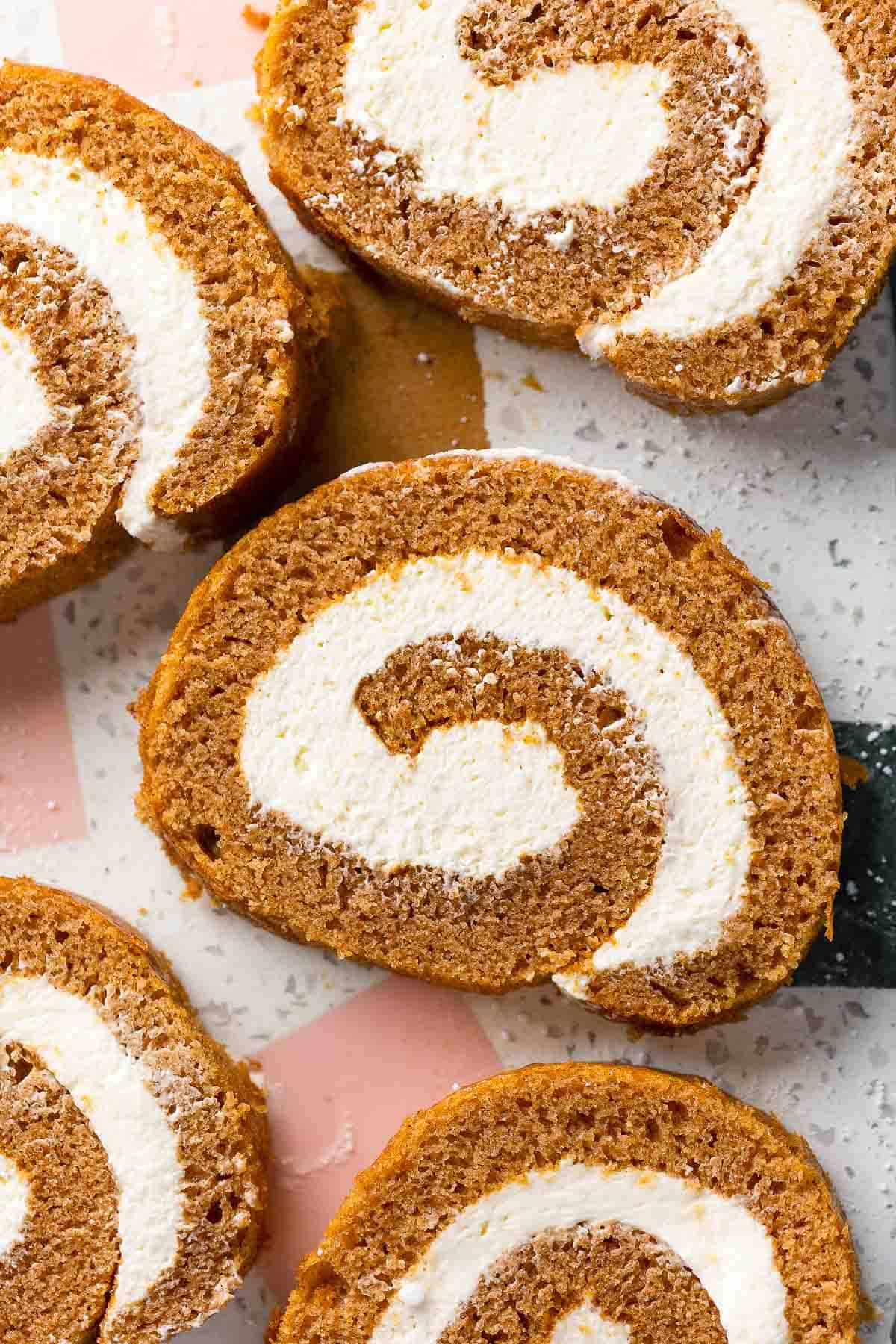 https://www.asaucykitchen.com/wp-content/uploads/2023/11/gluten-free-pumpkin-roll-whipped-cream-cheese-frosting-3.jpg