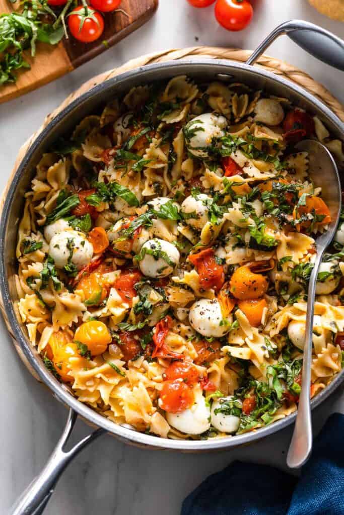 Burst Cherry Tomato Pasta with Herby Mozzarella in a large skillet