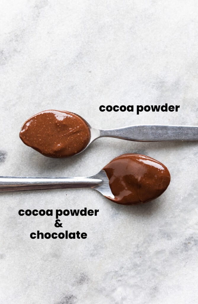 Two spoons full of homemade nutella: The top spoon is nutella made with only cocoa powder as the chocolate additions. The bottom spoon is nutella made with cocoa powder and melted chocolate