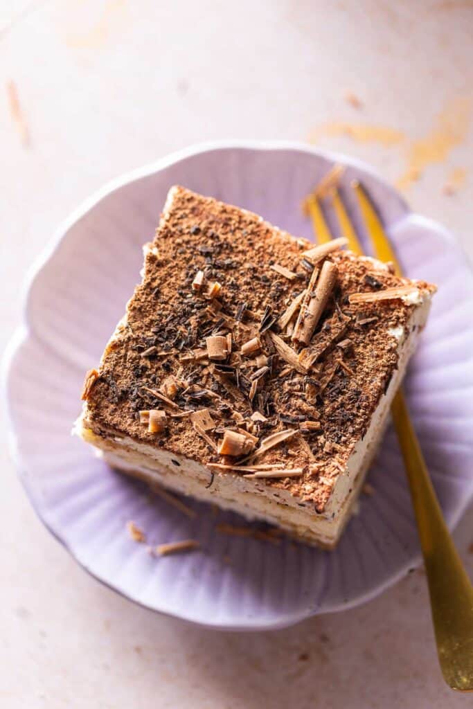 a slice of gluten free tiramisu on a plate