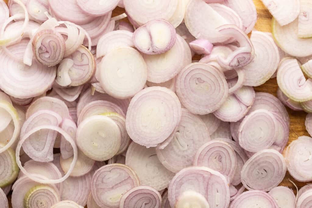 raw shallots cut into thin round slices 