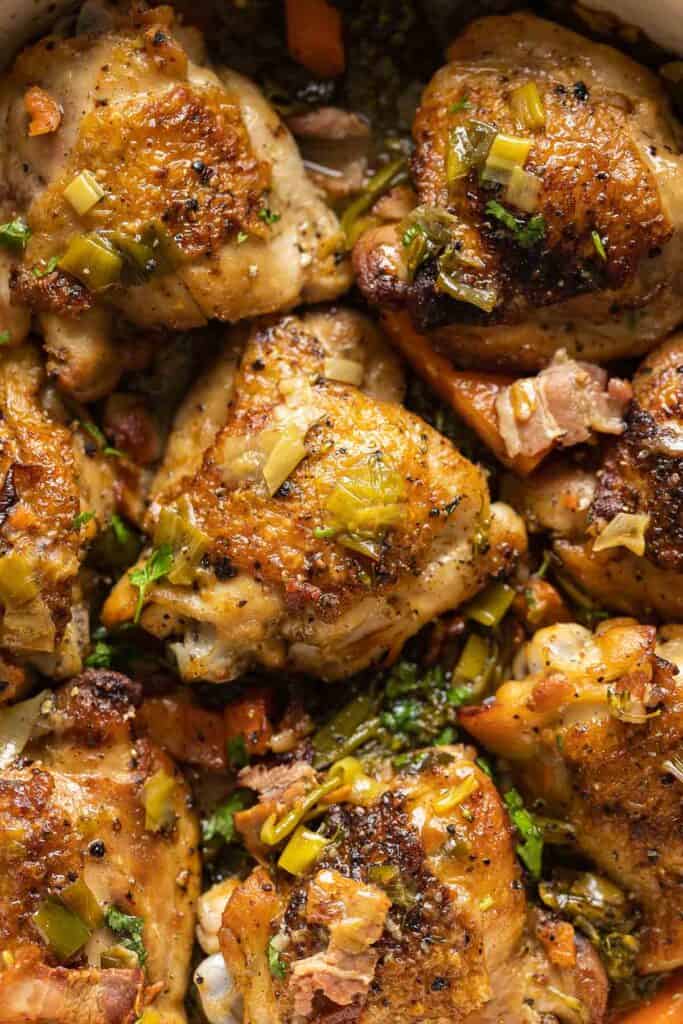 White Wine Braised Chicken Thighs with bacon bits, leeks, broccoli and carrots